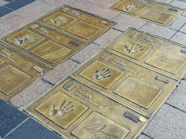 Bronze handprint plaques of BIFF film stars set into the pavement of Nampo-dong's BIFF Street