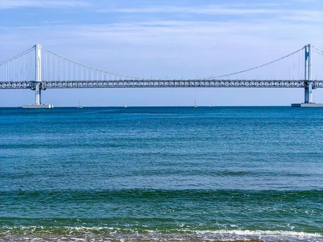 View of the sea and Gwangan Bridge from a Busan beach