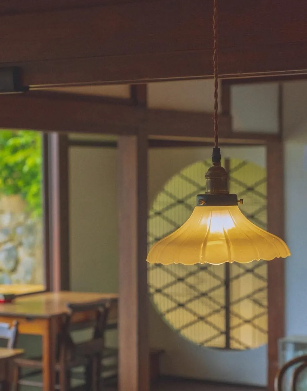 A vintage-style pendant light inside Chorang 1941