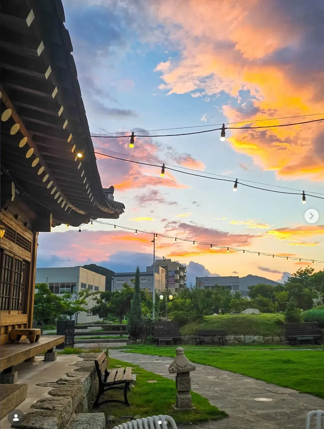 Daon Naru's hanok eaves against an evening sky