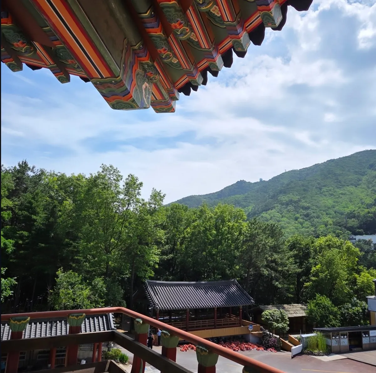 Dosol's temple-style eaves overlooking the mountains