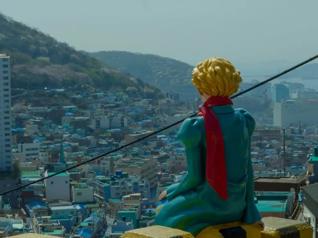 The Little Prince statue overlooking the colorful hillside houses of Gamcheon Culture Village