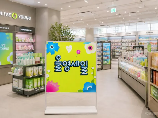 Inside an Olive Young store with a seasonal promotion sign