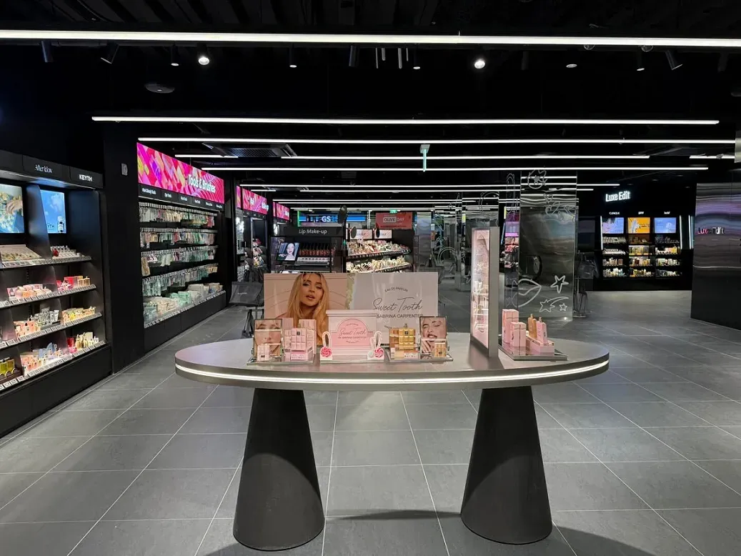 Wide aisles and display tables inside the Olive Young Seomyeon Town flagship store